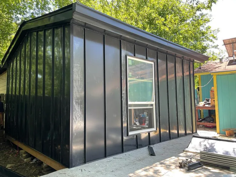 Black standing seam metal wall panels for Roof Inspection in Brookville