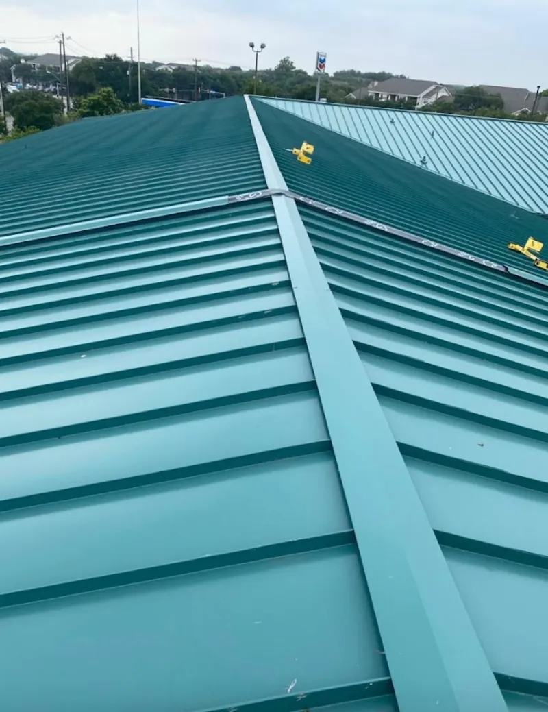 Green commercial metal roof ridge and valley for Metal Roof Repair in Brookville