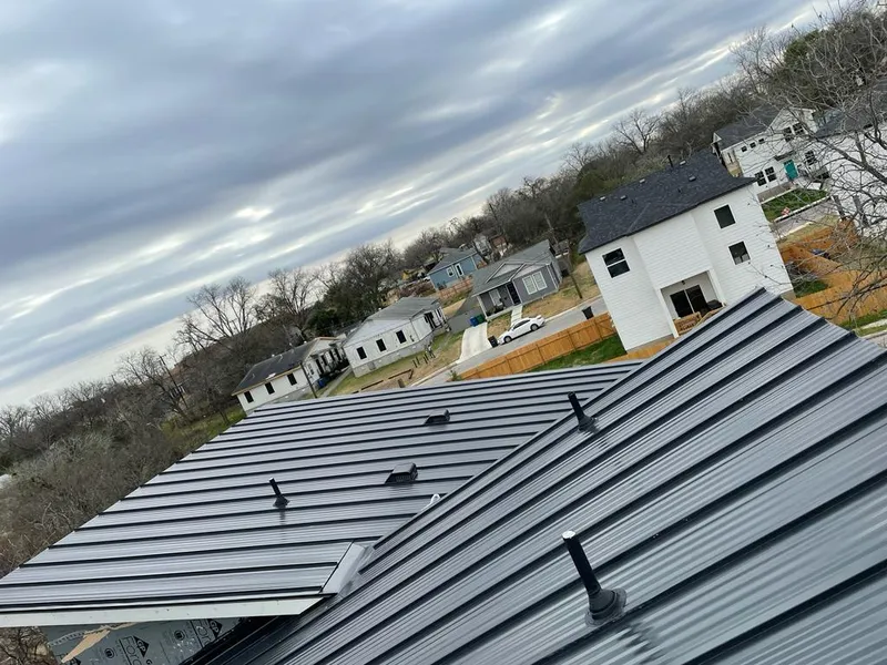 Standing seam metal roof panels with vents for Skylight Repair in Brookville